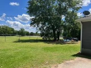 a view of a golf course with a park