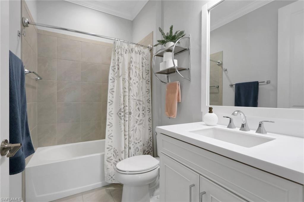 2194 Marquesa Circle Naples, FL 34112 - Photo 19 of 38 a bathroom with a sink toilet and shower