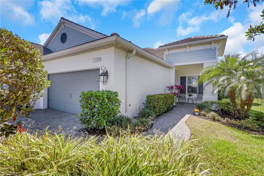 2194 Marquesa Circle Naples, FL 34112 - Photo 2 of 38 front view of a house