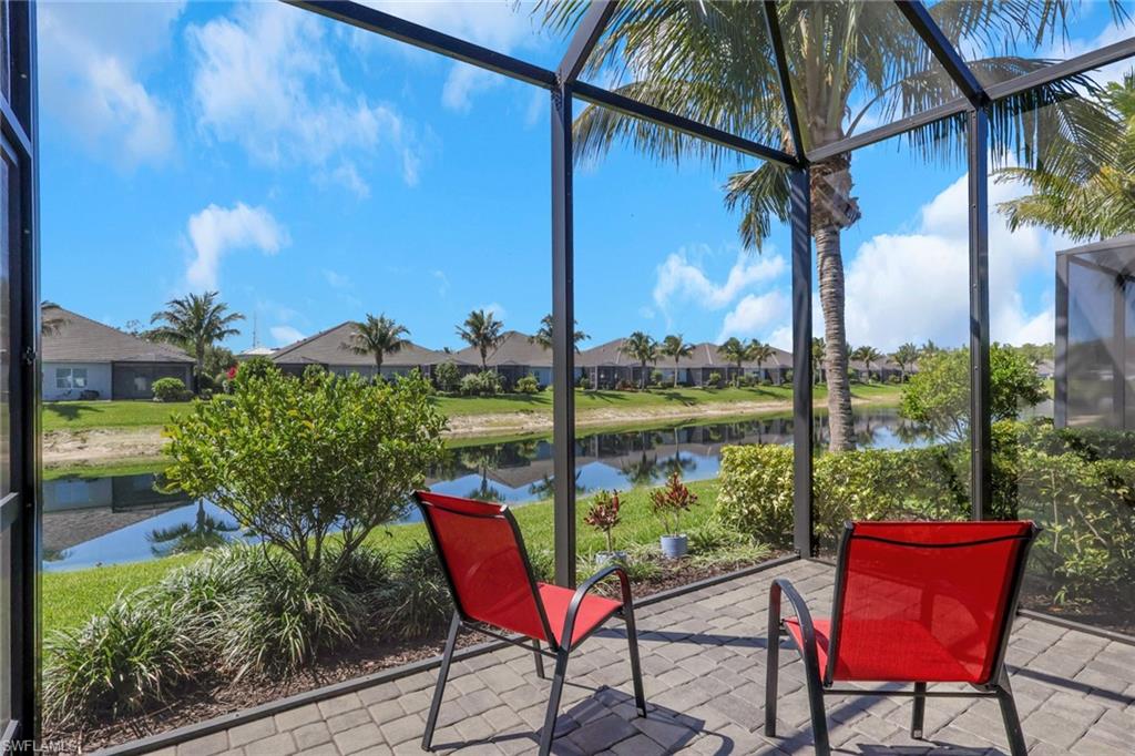2194 Marquesa Circle Naples, FL 34112 - Photo 23 of 38 a view of a chairs and table in the patio