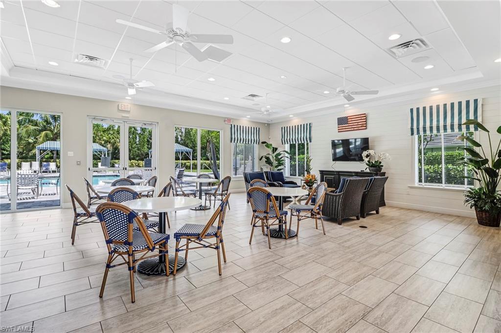 2194 Marquesa Circle Naples, FL 34112 - Photo 33 of 38 a view of a dining room with furniture window and outside view