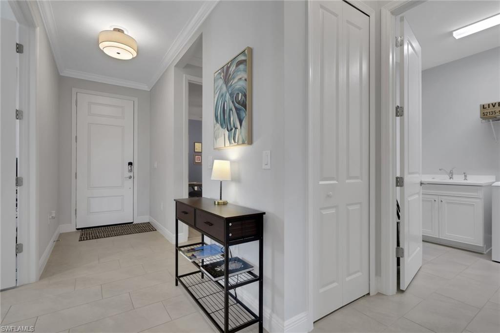 2194 Marquesa Circle Naples, FL 34112 - Photo 4 of 38 a view of a livingroom with furniture and window