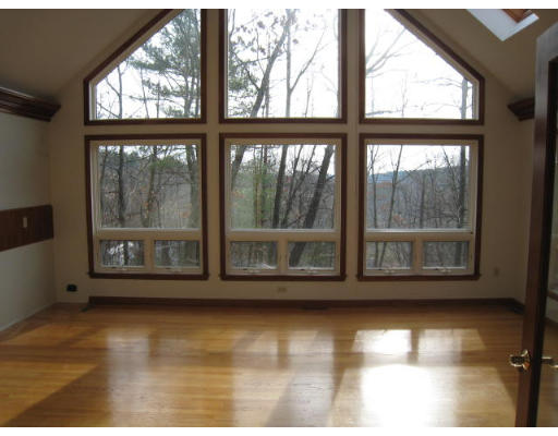 5 Wayside Inn Road Framingham, MA 01701 - Photo 9 of 11 a view of an empty room with a window