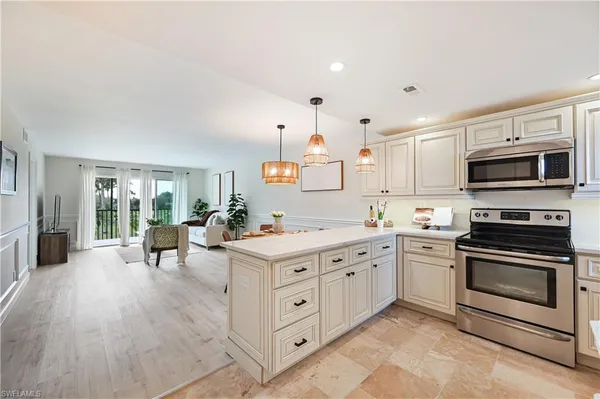 a view of a park with palm trees