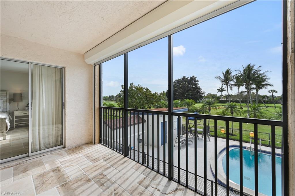 190 Pebble Beach Boulevard, Unit 202 Naples, FL 34113 - Photo 29 of 36 a view of a balcony