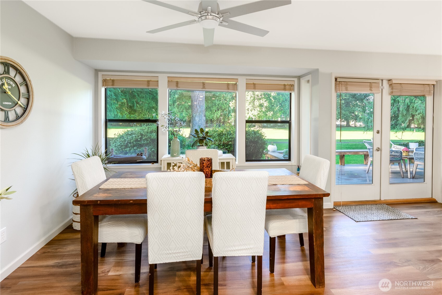 115 Fairway Drive Sequim, WA 98382 - Photo 11 of 39 a view of a dining room with furniture window and wooden floor