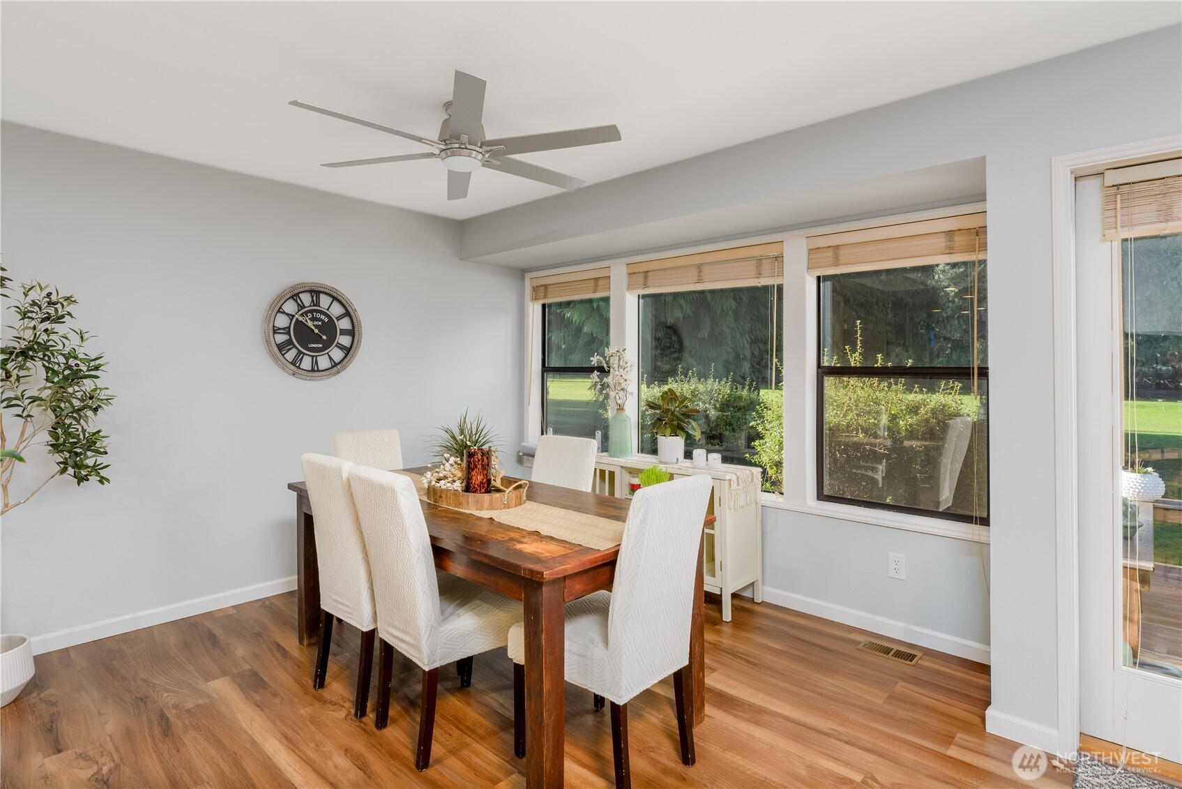 115 Fairway Drive Sequim, WA 98382 - Photo 12 of 39 a dining room with furniture window wooden floor