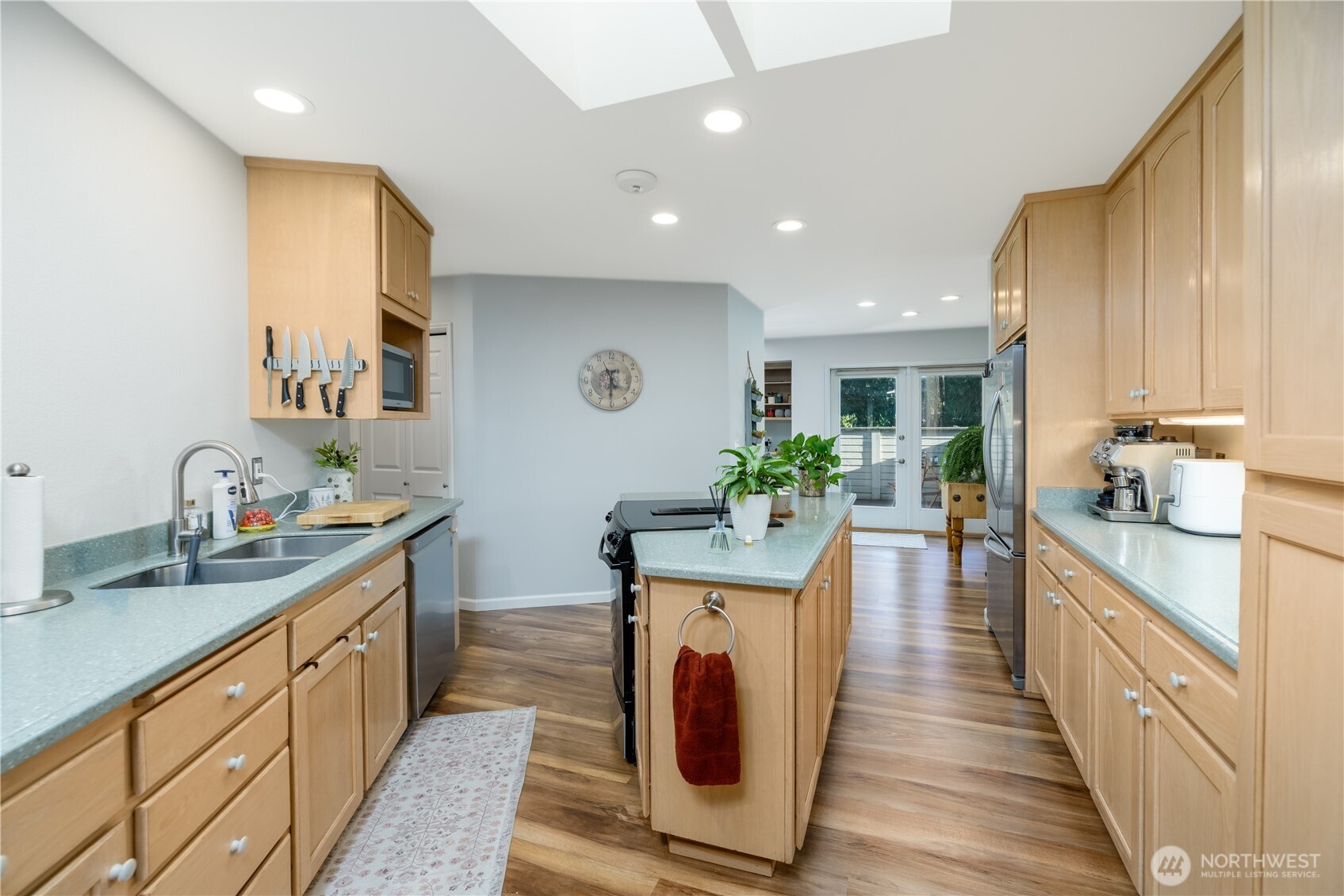 115 Fairway Drive Sequim, WA 98382 - Photo 14 of 39 a kitchen with sink and stove
