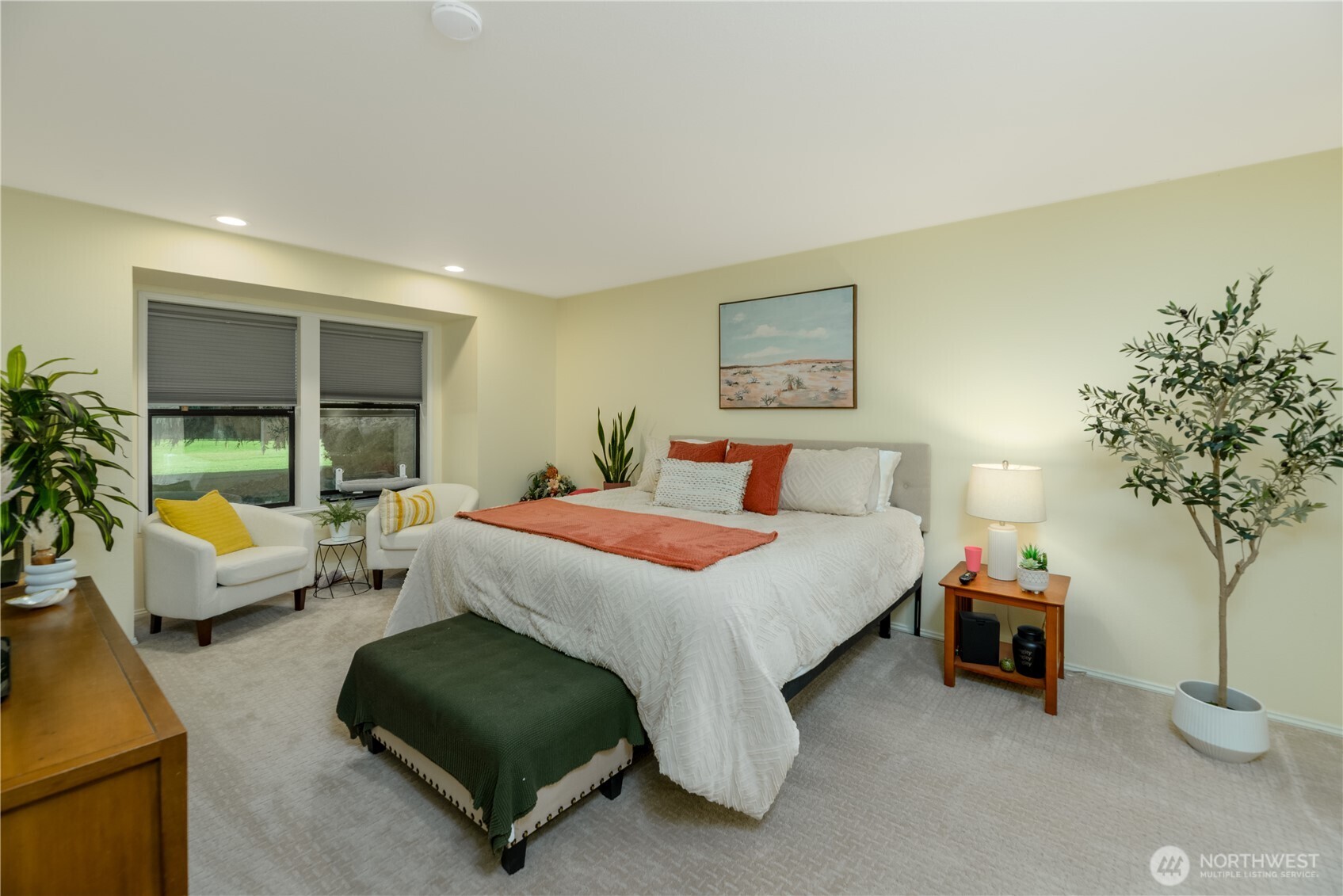 115 Fairway Drive Sequim, WA 98382 - Photo 23 of 39 a bedroom with a bed and a couch