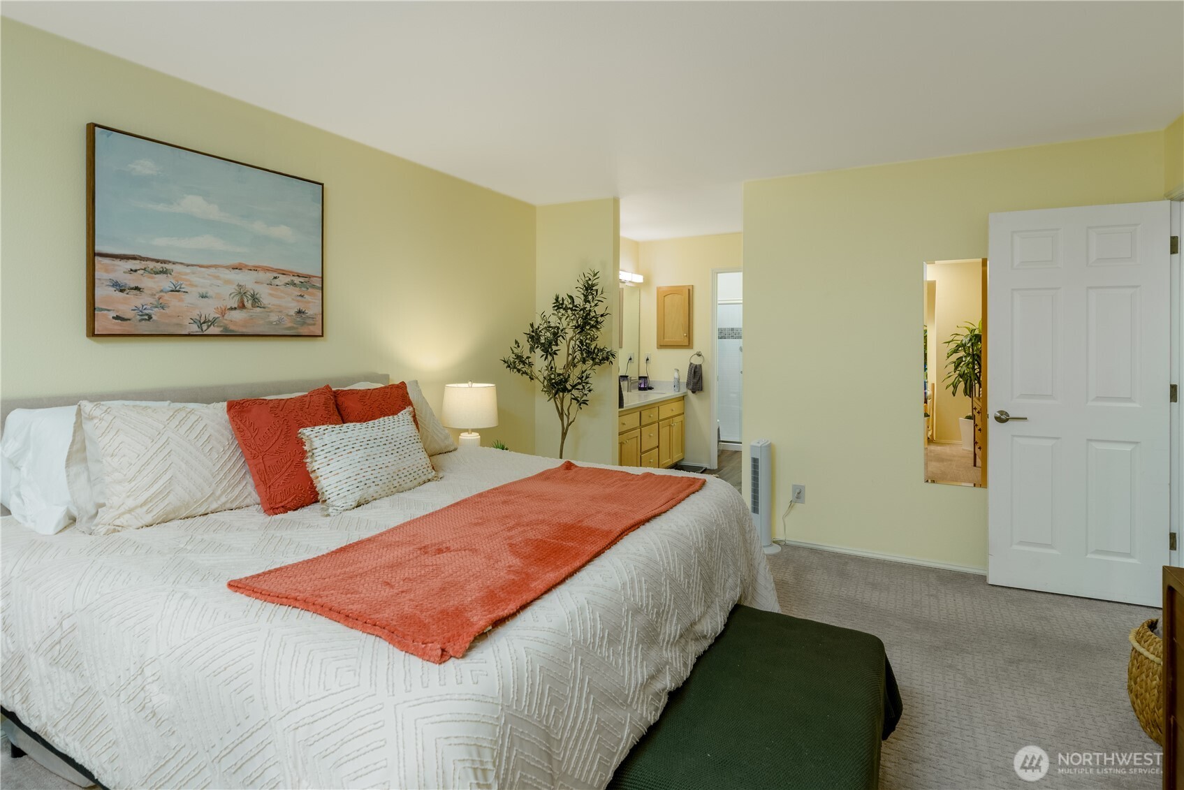 115 Fairway Drive Sequim, WA 98382 - Photo 24 of 39 a bedroom with a bed and a painting on the wall