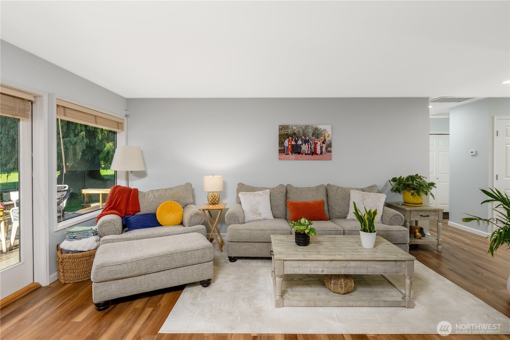 115 Fairway Drive Sequim, WA 98382 - Photo 8 of 39 a living room with furniture potted plant and a large window