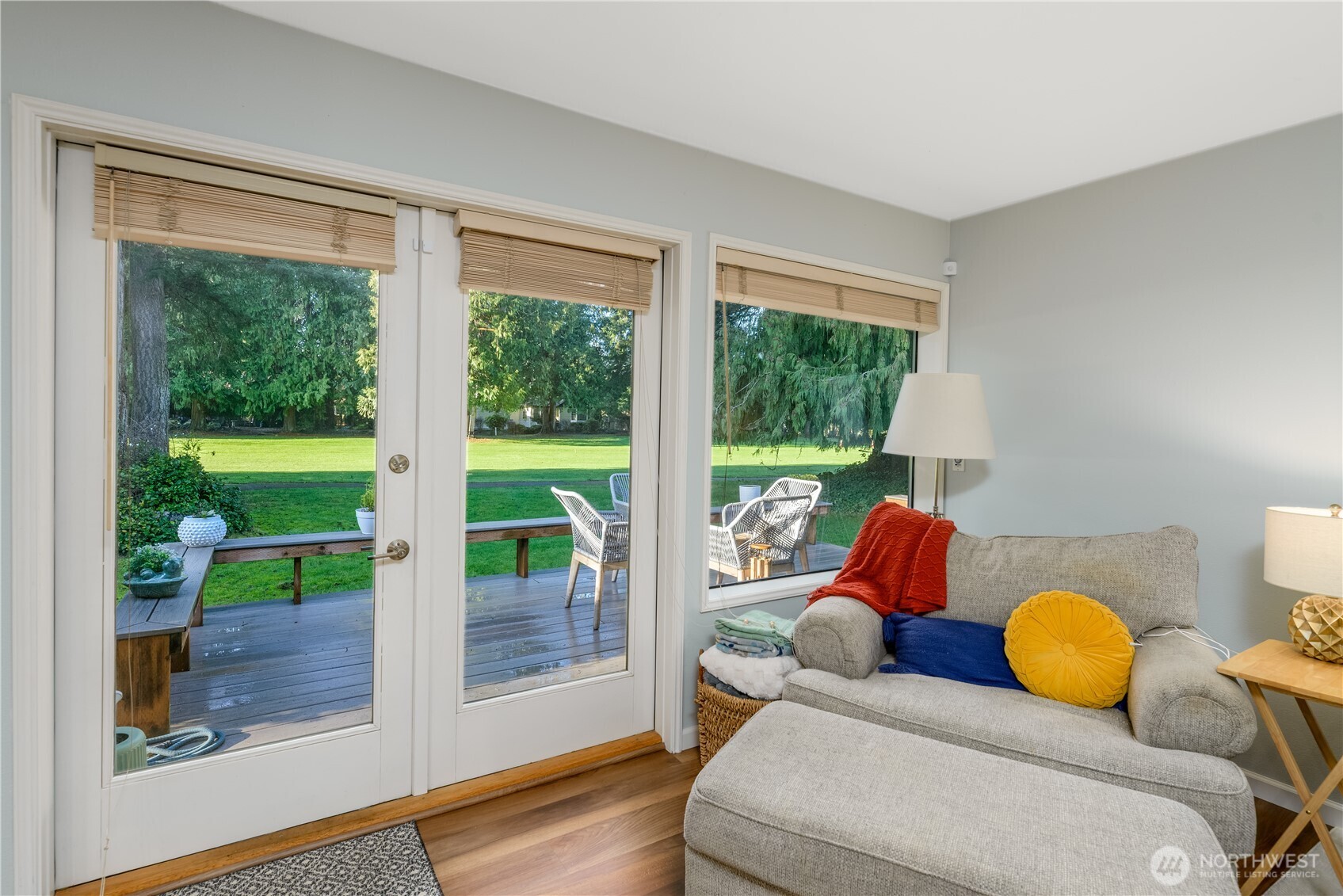 115 Fairway Drive Sequim, WA 98382 - Photo 9 of 39 a living room with furniture and a floor to ceiling window