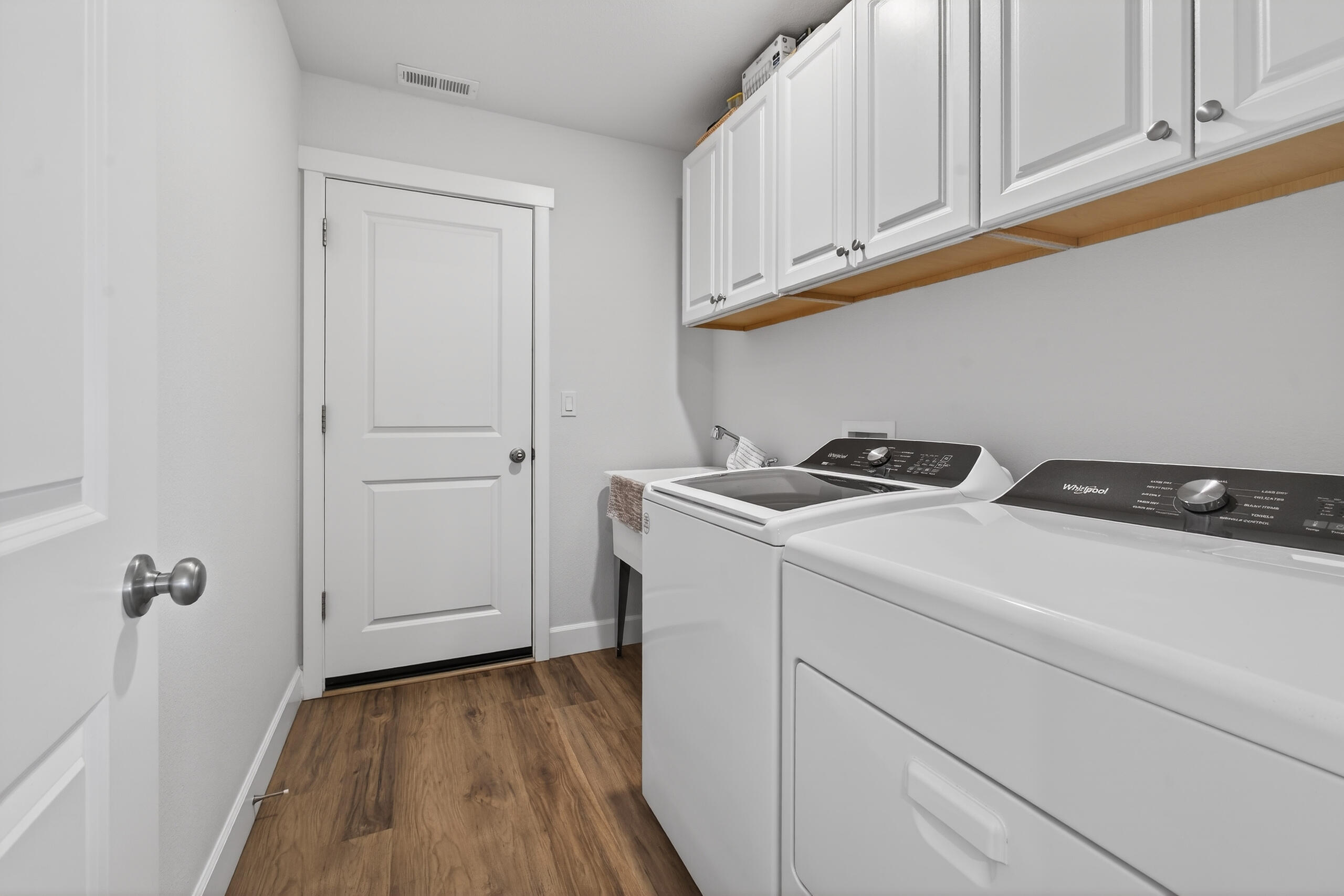 1225 Northwest Willow Parkway Road Madras, OR 97741 - Photo 12 of 31 Laundry Room, built in cabinets & garage access