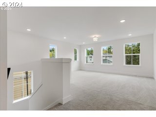 17127 Southwest Kalapuya Lane Sherwood, OR 97140 - Photo 13 of 18 a view of an empty room with a window