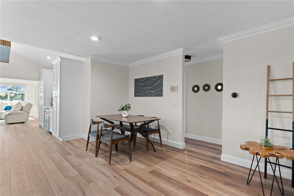 3300 Floramar Terrace New Port Richey, FL 34652 - Photo 13 of 75 a view of a livingroom with furniture and wooden floor