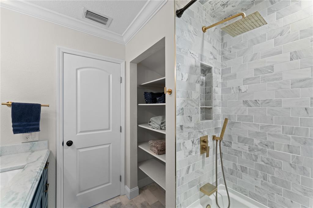 3300 Floramar Terrace New Port Richey, FL 34652 - Photo 36 of 75 a bathroom with a shower and a sink