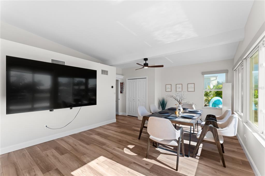 3300 Floramar Terrace New Port Richey, FL 34652 - Photo 46 of 75 a living room with furniture and a flat screen tv