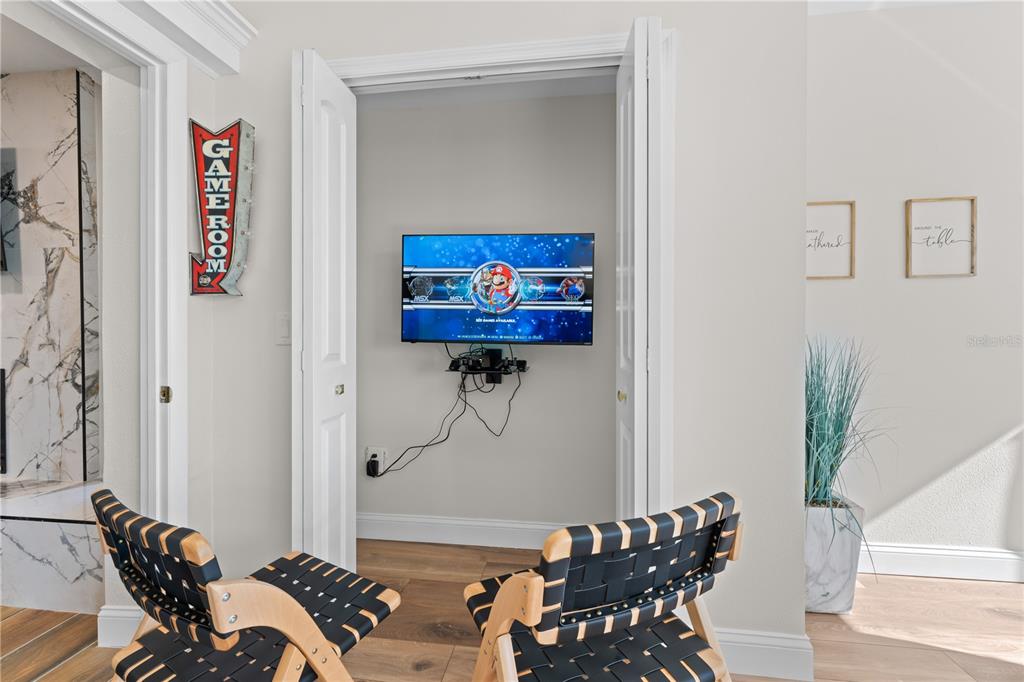 3300 Floramar Terrace New Port Richey, FL 34652 - Photo 54 of 75 a view of a livingroom with furniture and a potted plant