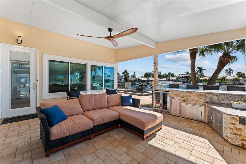 3300 Floramar Terrace New Port Richey, FL 34652 - Photo 63 of 75 a living room with furniture and a large window