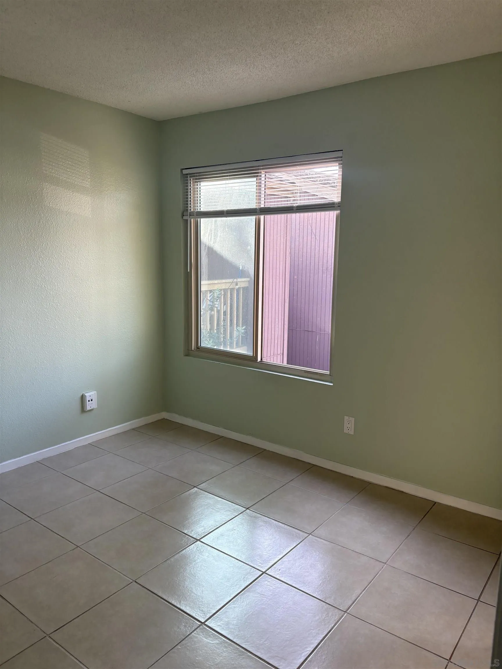 5962 Rancho Mission Road, Unit 222 San Diego, CA 92108 - Photo 13 of 42 an empty room with windows