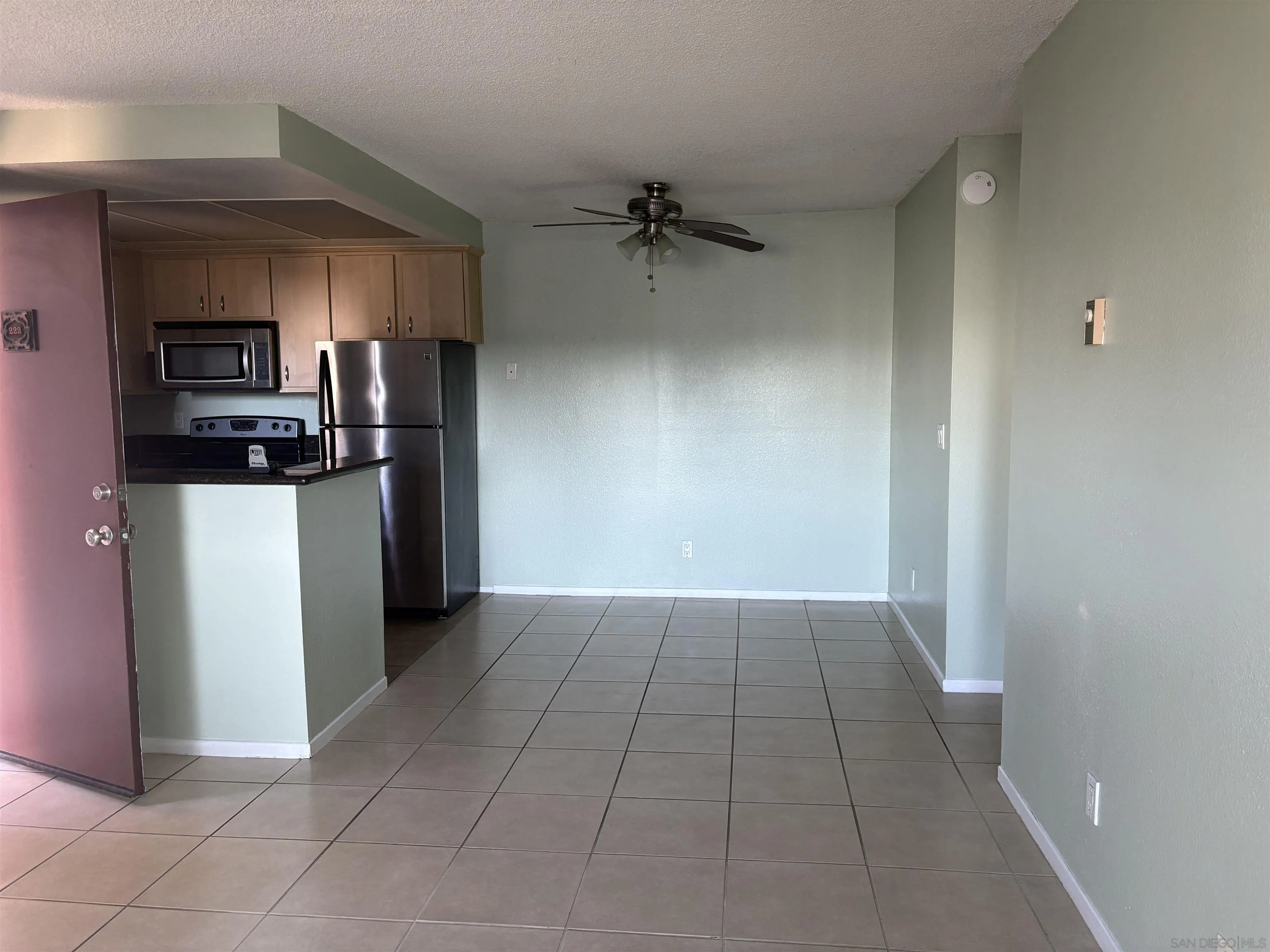 5962 Rancho Mission Road, Unit 222 San Diego, CA 92108 - Photo 22 of 42 a view of a kitchen with a sink