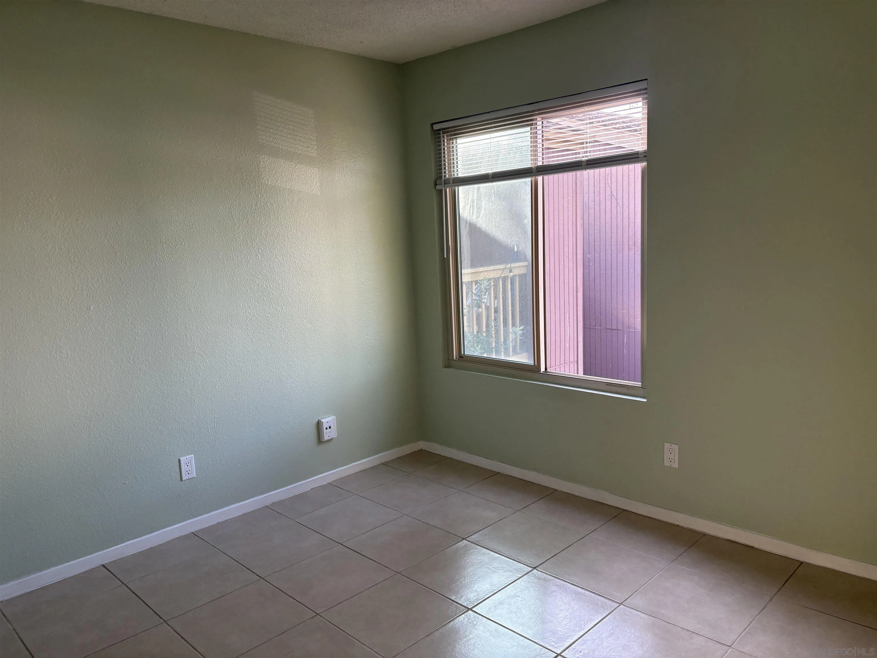 5962 Rancho Mission Road, Unit 222 San Diego, CA 92108 - Photo 25 of 42 an empty room with a window