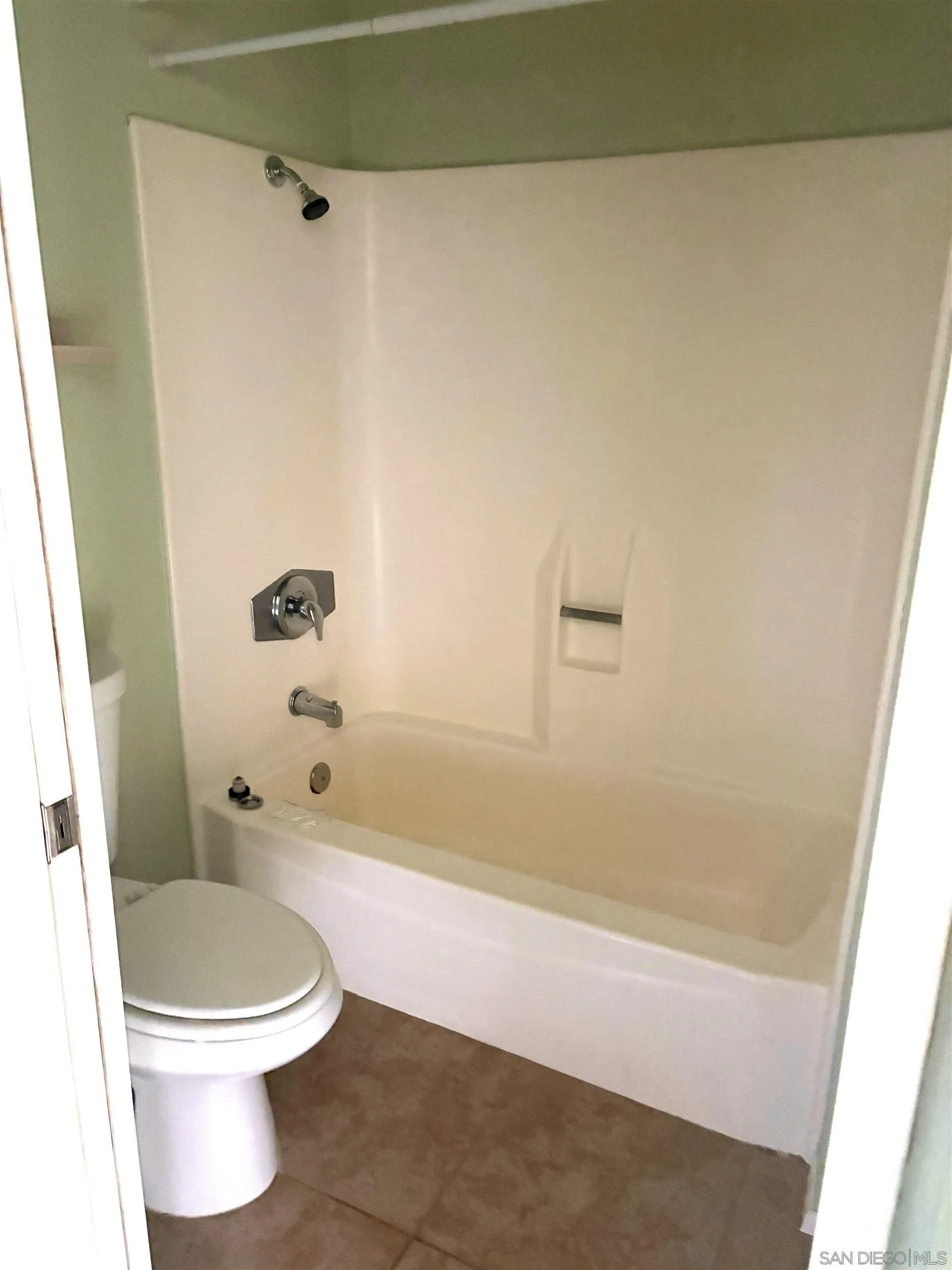 5962 Rancho Mission Road, Unit 222 San Diego, CA 92108 - Photo 34 of 42 a bathroom with a toilet and a shower