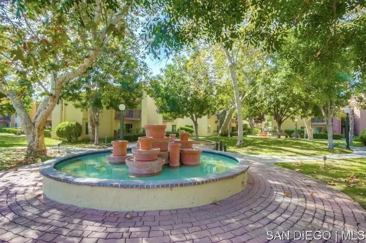 5962 Rancho Mission Road, Unit 222 San Diego, CA 92108 - Photo 4 of 42 a view of a house with backyard and sitting area