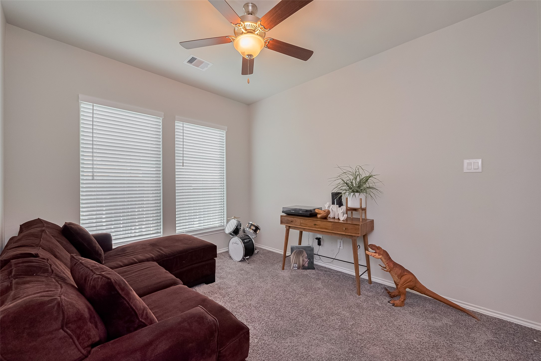 25446 Fossa Drive Tomball, TX 77375 - Photo 23 of 29 a living room with furniture and a window
