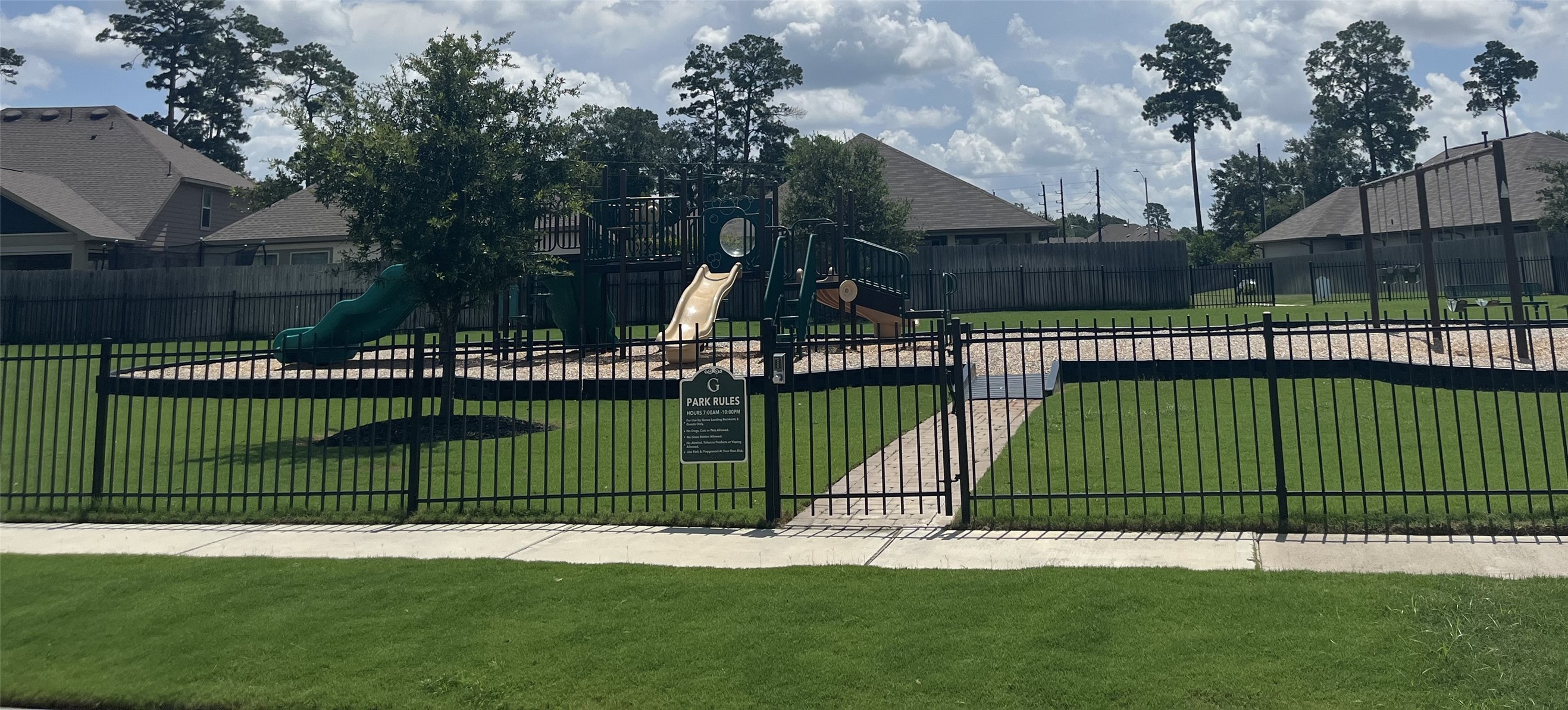 25446 Fossa Drive Tomball, TX 77375 - Photo 28 of 29 a view of a gate and fence