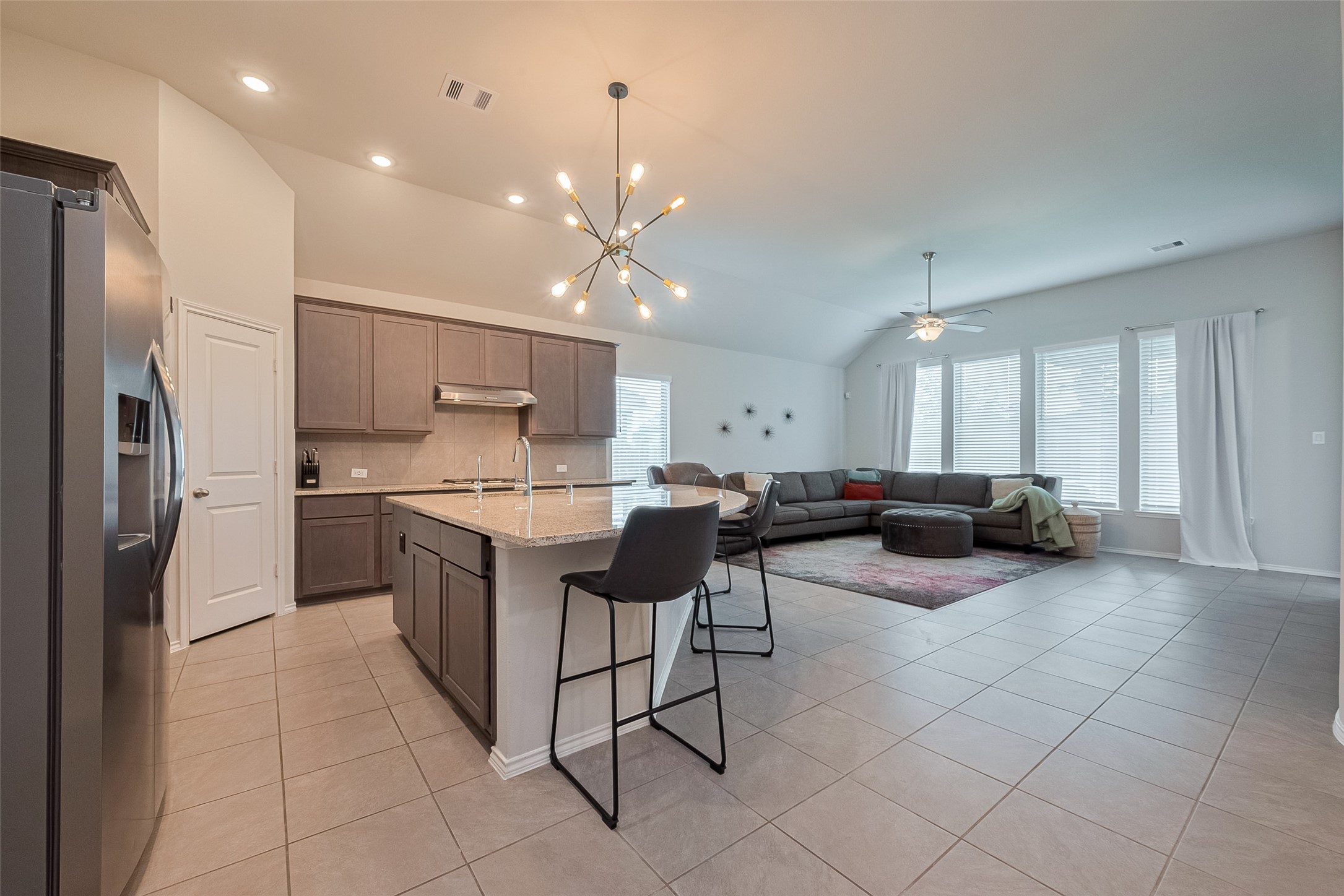 25446 Fossa Drive Tomball, TX 77375 - Photo 5 of 29 a large white kitchen with cabinets