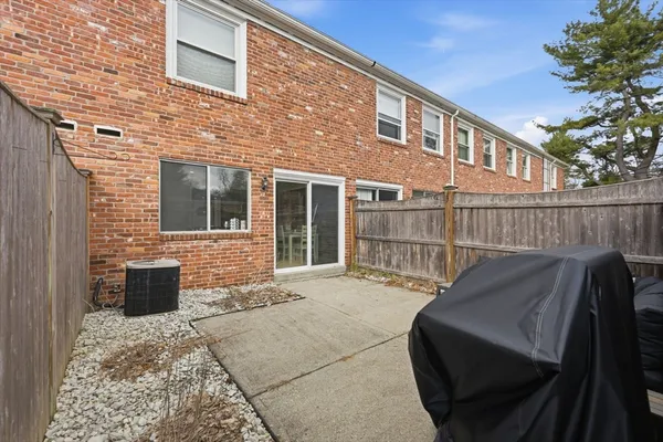 a view of a terrace with furniture