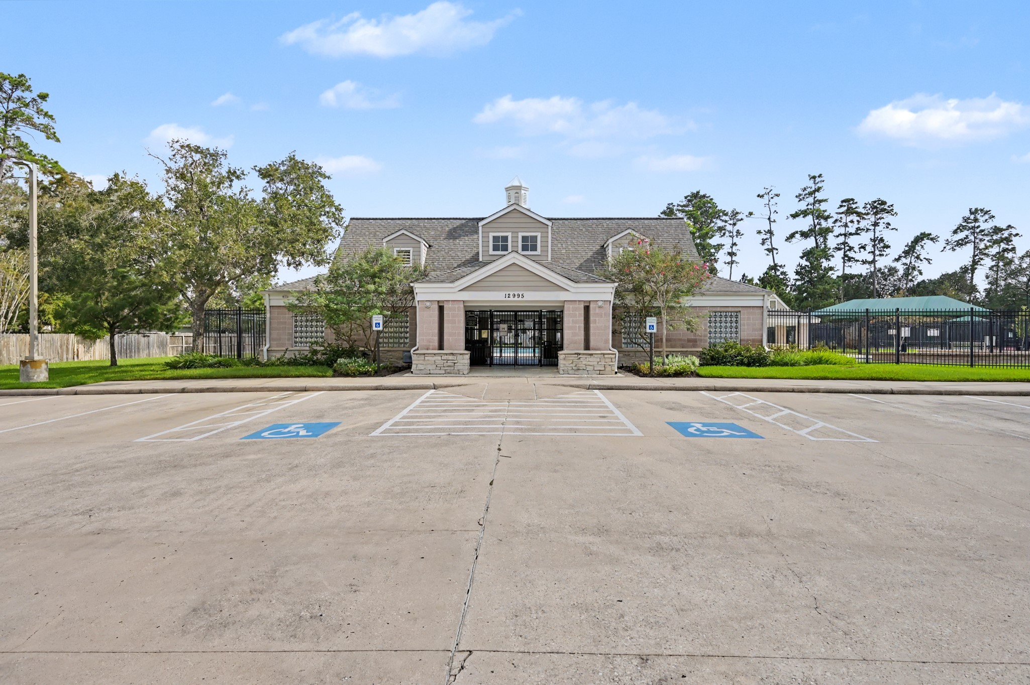 14938 Codys Run Cypress, TX 77429 - Photo 47 of 50 This is the other swimming pool with the second set of tennis/pickleball courts and playground.
