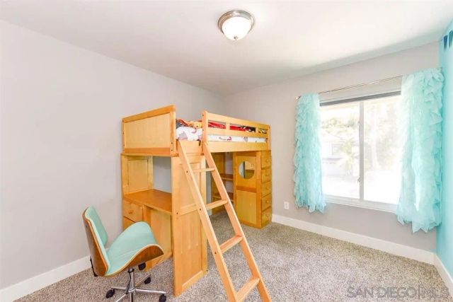 a view of a room with windows