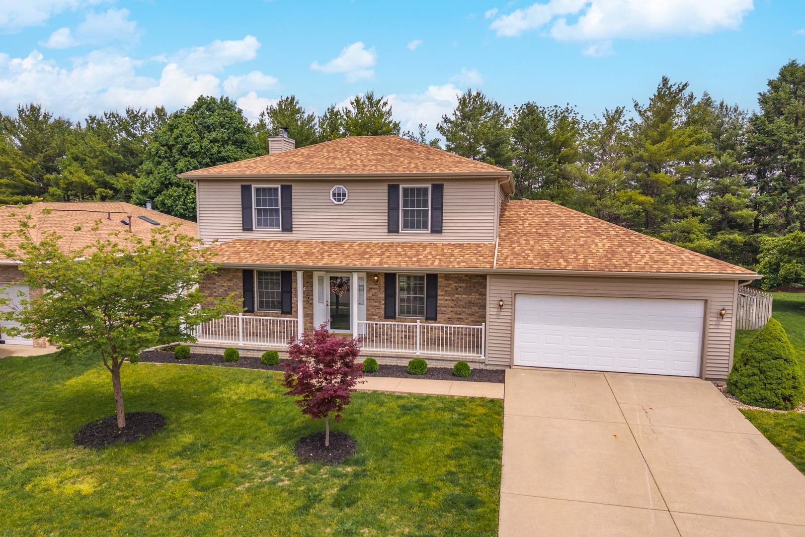 814 Landau Lane Normal, IL 61761 - Photo 52 of 58 a front view of a house with garden