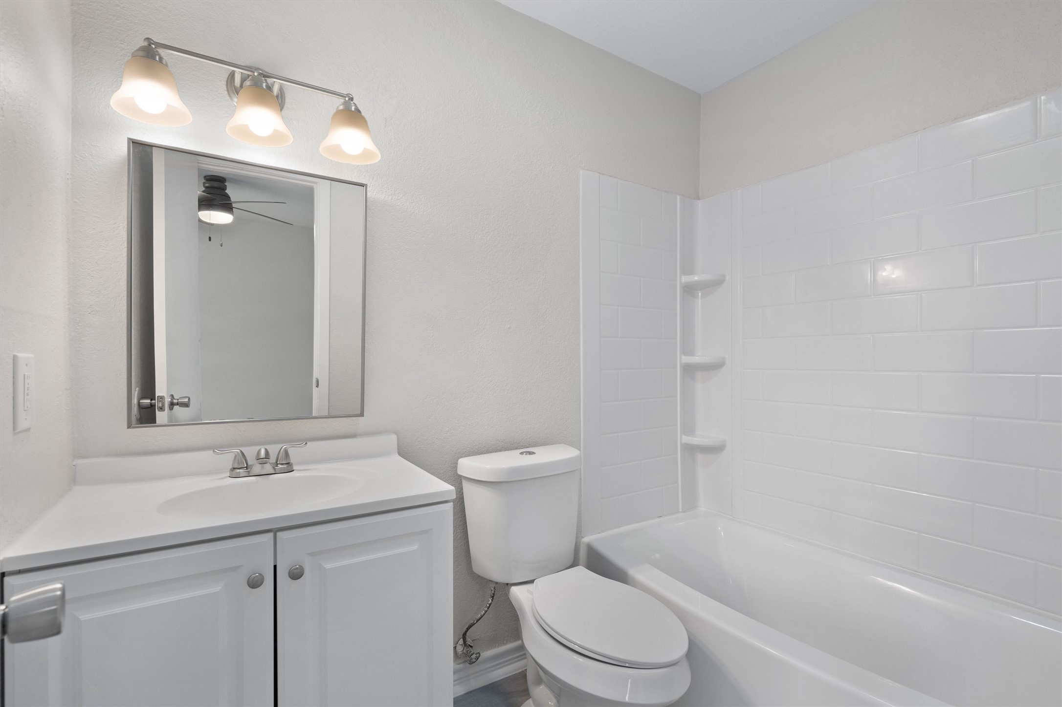 2532 Chaparral Trail Austin, TX 78744 - Photo 13 of 27 a bathroom with a sink a toilet and shower
