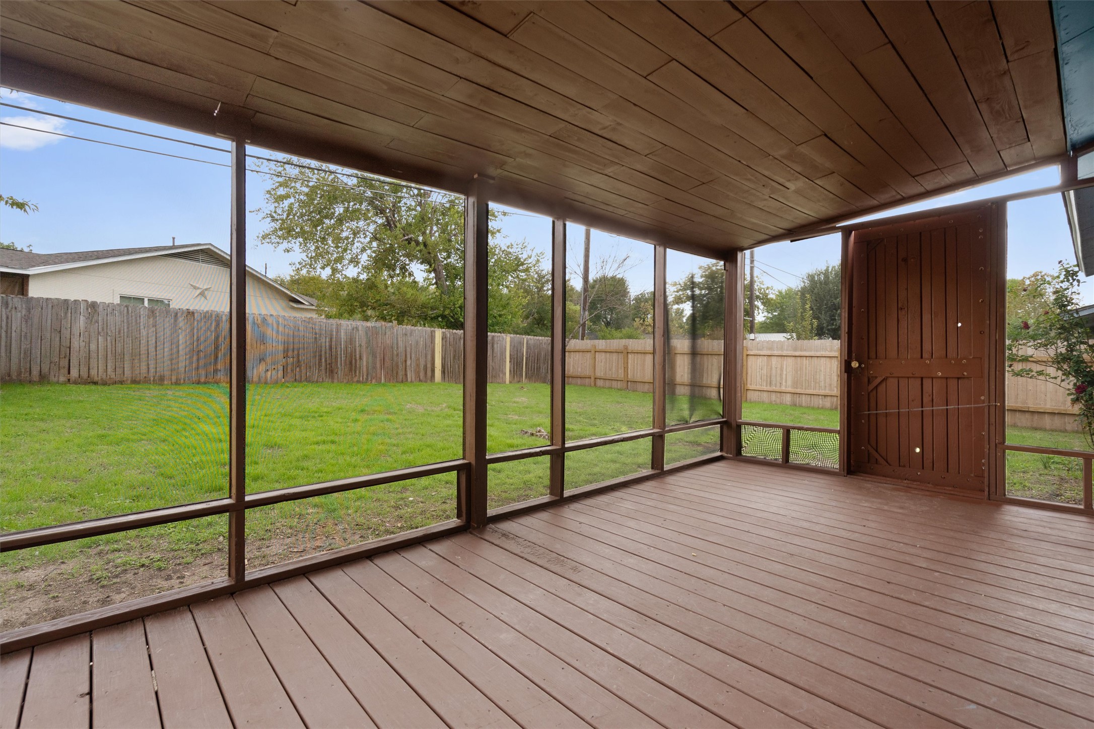 2532 Chaparral Trail Austin, TX 78744 - Photo 22 of 27 a view of a backyard with wooden floor