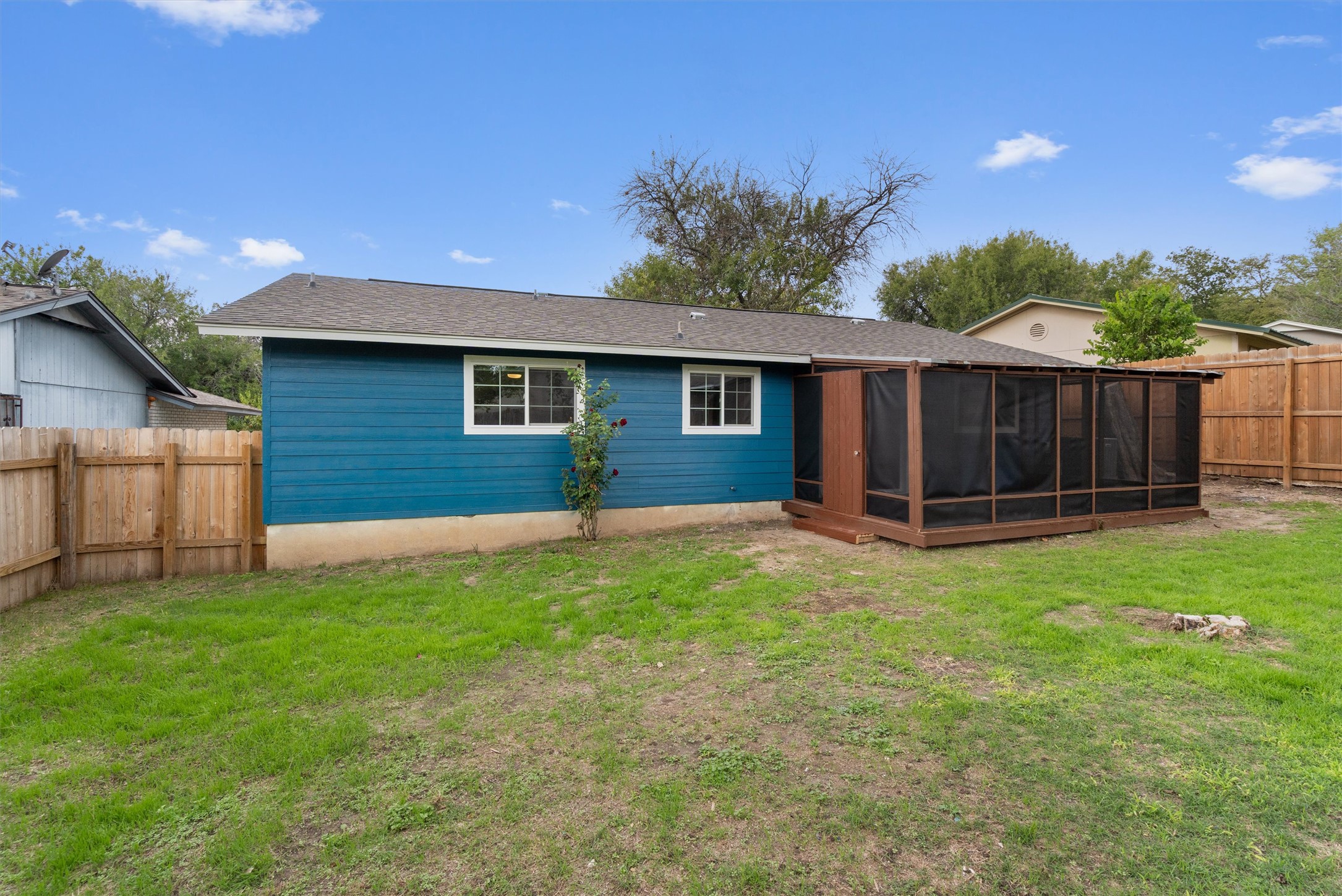 2532 Chaparral Trail Austin, TX 78744 - Photo 25 of 27 a view of a house with backyard and porch