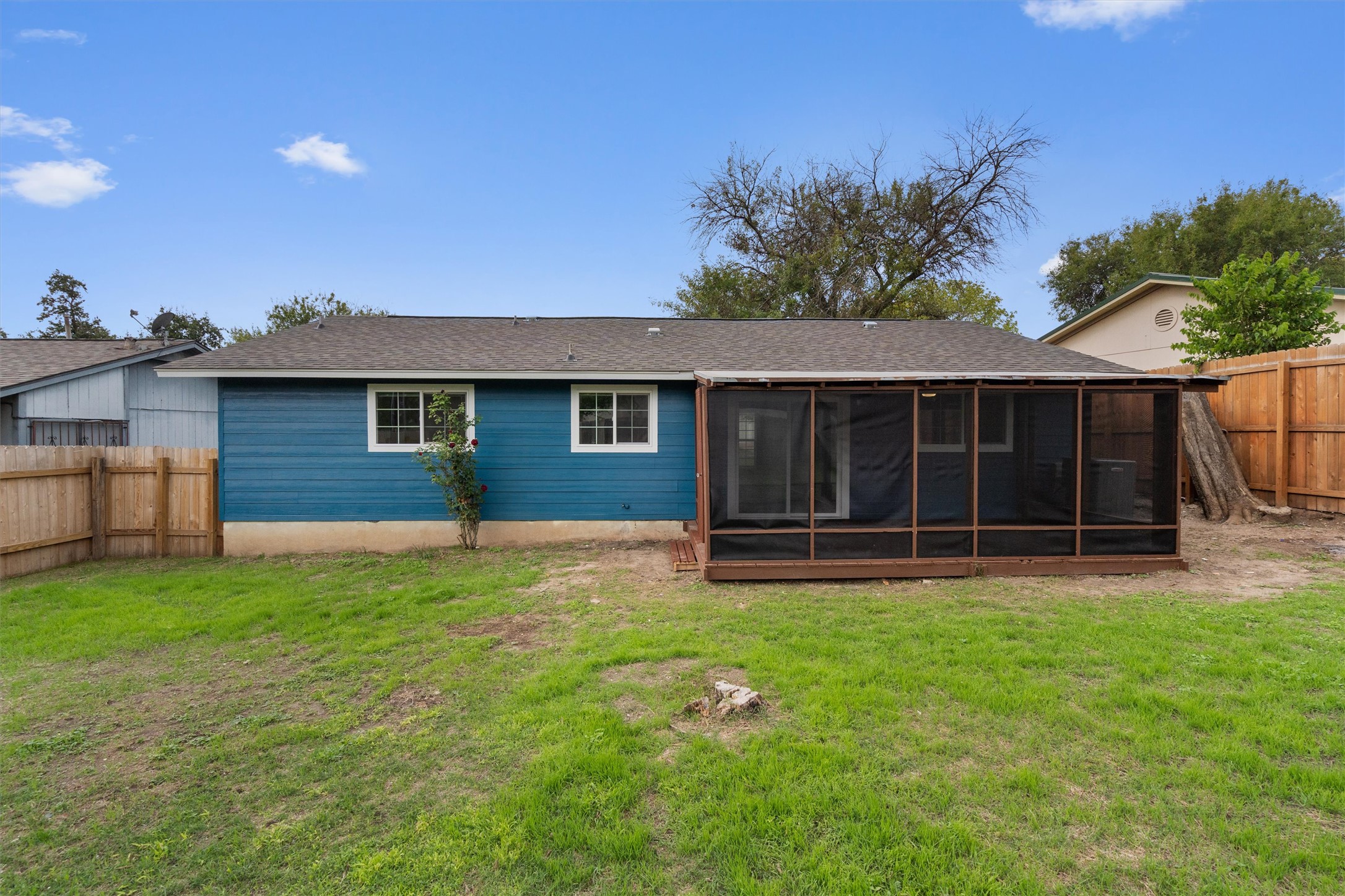 2532 Chaparral Trail Austin, TX 78744 - Photo 26 of 27 a front view of a house with a yard and porch