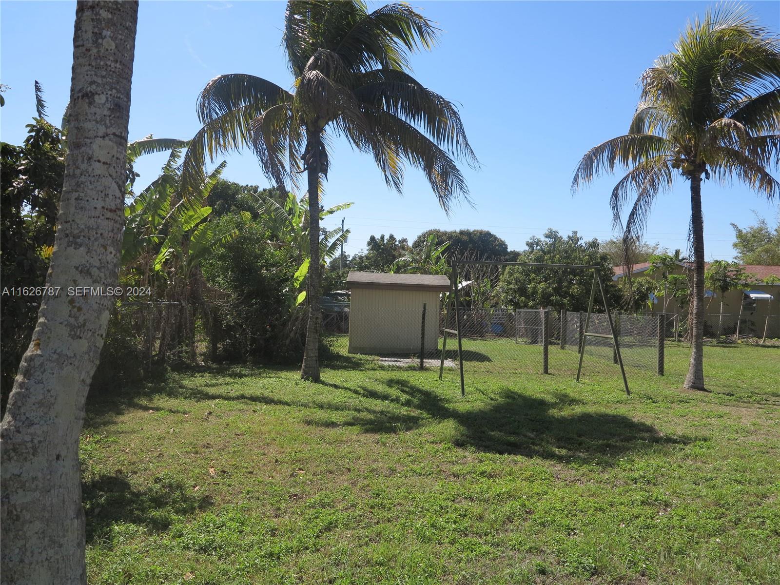 24925 Southwest 134th Court Homestead, FL 33032 - Photo 2 of 37 a view of a backyard