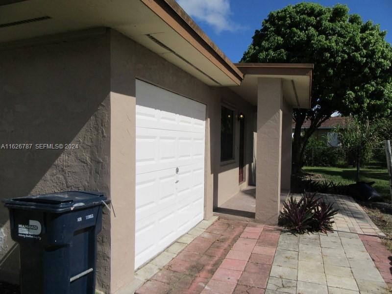 24925 Southwest 134th Court Homestead, FL 33032 - Photo 21 of 37 a view of a entryway door of the house