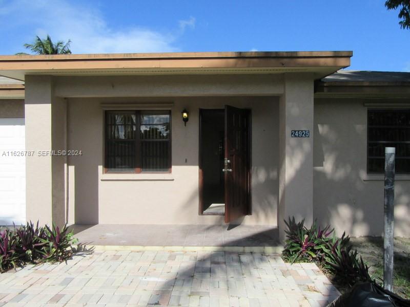 24925 Southwest 134th Court Homestead, FL 33032 - Photo 37 of 37 a view of a entryway front of house