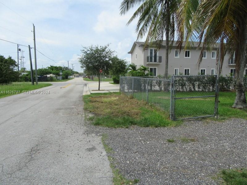 24925 Southwest 134th Court Homestead, FL 33032 - Photo 7 of 37 a view of a yard with palm trees