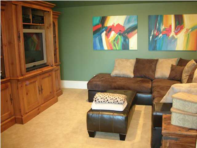 2945 Pine Valley Road Miramar Beach, FL 32550 - Photo 11 of 20 a living room with furniture and a flat screen tv