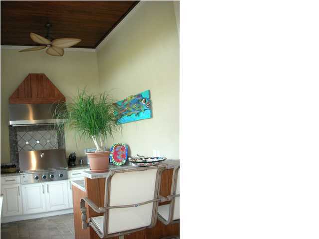 2945 Pine Valley Road Miramar Beach, FL 32550 - Photo 14 of 20 a table room with a desk and chair