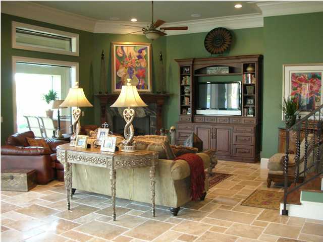 2945 Pine Valley Road Miramar Beach, FL 32550 - Photo 9 of 20 a living room with fireplace furniture and a flat screen tv