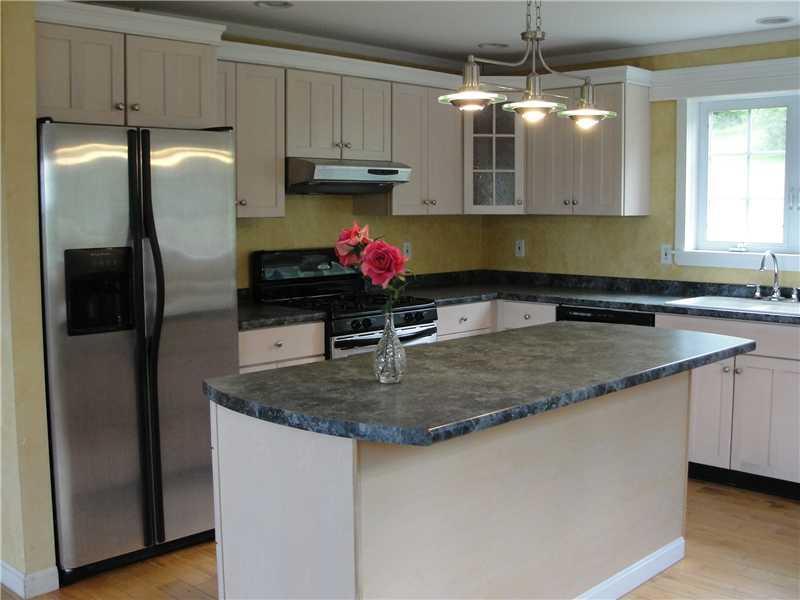 8 Little Pond Road Otisfield, ME 04270 - Photo 13 of 35 Kitchen. The breakfast bar is...