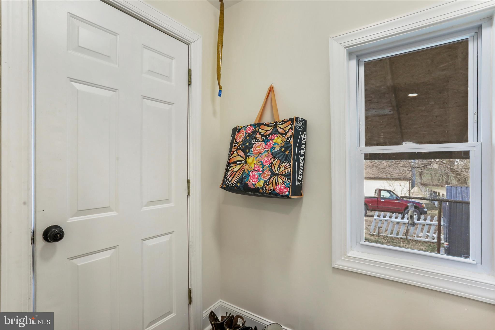 8118 Mapleville Road Boonsboro, MD 21713 - Photo 12 of 30 a view of a hallway with paintings on the wall
