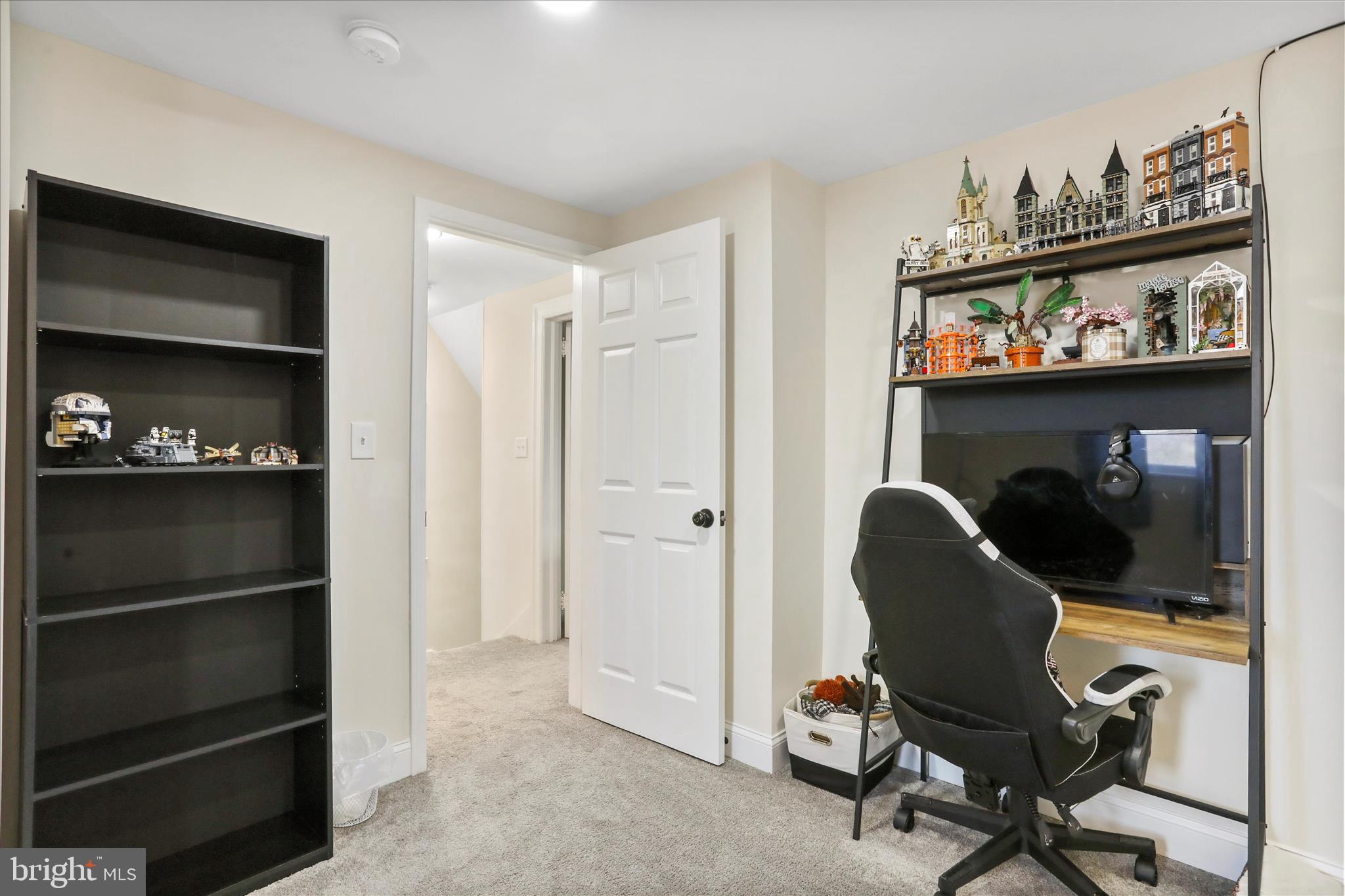 8118 Mapleville Road Boonsboro, MD 21713 - Photo 19 of 30 a workspace with furniture and a closet