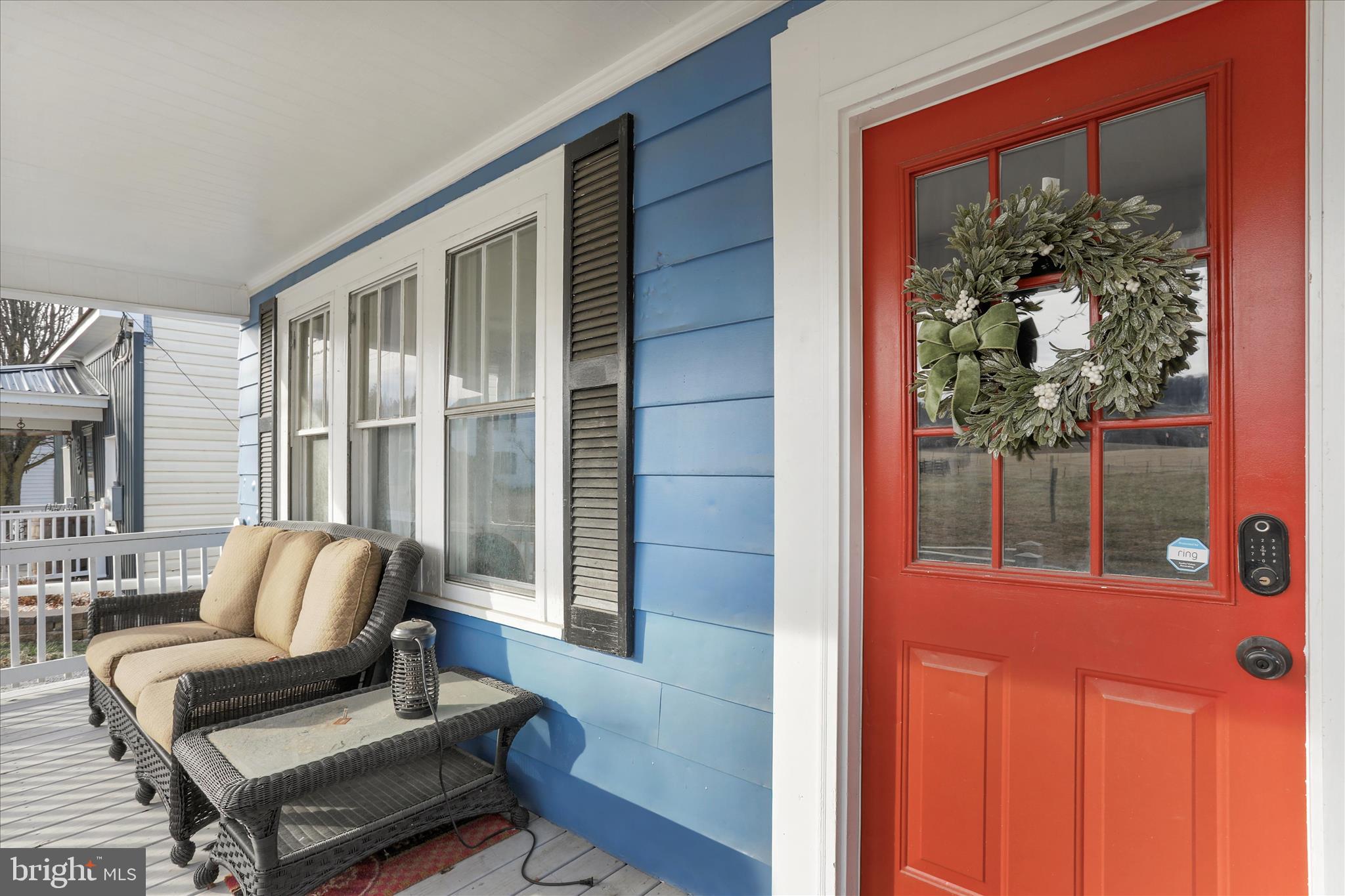 8118 Mapleville Road Boonsboro, MD 21713 - Photo 2 of 30 a living room with furniture and a large window